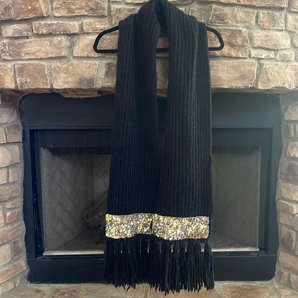 Express black scarf with gold and silver sequin.